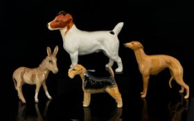 A Collection Of Beswick Ceramic Figures Four in total to include model no.