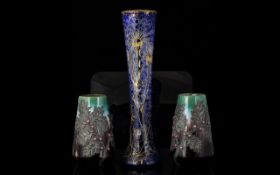 A Pair Of Continental Drip Glaze Vases Each with overlaid silvered leaf detail and coral coloured