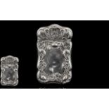 Art Nouveau Period Tulip Design Silver Hinged Vesta Case. Both lid and borders decorated in relief.