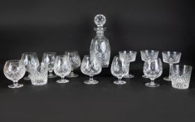 Cut Glass Drinking Set Comprising Of A Cut Glass Decanter With Stopper. Star Burst Design To Base.