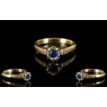 A 9ct Gold And Platinum Single Stone Sapphire Ring Stamped Platinum 9ct, ring size L.5. Weight, 2.