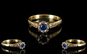 A 9ct Gold And Platinum Single Stone Sapphire Ring Stamped Platinum 9ct, ring size L.5. Weight, 2.