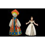 Vintage Tin Clockwork Matryoshka Doll Tin doll in traditional dress with red, yellow,