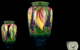 William Moorcroft Signed Tube lined Large Vase 'Leaf & Berry' Design. Circa 1928-1934.