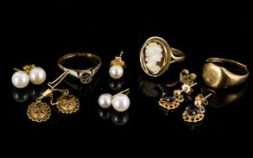 A Small Collection of Yellow Metal 9ct And 18ct Gold Items A varied lot,