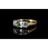 A 9ct Gold CZ Ring Set with blue and clear faceted princess cut stones, fully hallmarked,