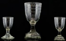 An 18th Century German Glass Goblet Etched bowl with square base, polished pontil, engraving in