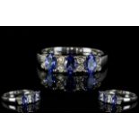 14ct White Gold Tanzanite and Diamond Set Dress Ring, Marked 14ct.