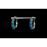 Neon Apatite Hoop Earrings, three oval cuts of the rarest and brightest of the apatite stones,