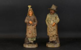 A Pair Of Early 20th Century Continental Ceramic Figures Two painted earthenware figures in the