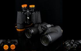 A Cased Pair Of Janik 7 x 50 De Luxe Binoculars Together With Cased 'Horizon' 10 x 50 Binoculars