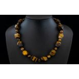 Tiger Eye Fancy Cut Bead Necklace, a str