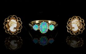 A 9ct Gold And Synthetic Opal Dress Ring Fully hallmarked to inner shank, 375 for 9ct gold,