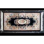 Oriental Style Wool Rug Rectangular runner of small proportion, black ground with central oval