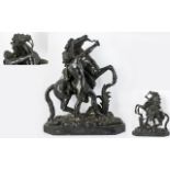 A Bronze Sculpture Of A Marley Horse And Rider 19th century figure on black marble base,