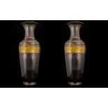 A Pair Of Mixed Metal Vases Of neoclassical design with swag and scroll borders.