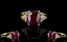 Ruby Solitaire and White Topaz Accents Ring, a 4.25ct elongated cushion cut ruby accented to