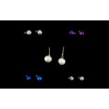 Set of Five Pairs of Interchangeable Fresh Water Pearl Earrings, the set comprising a pair of silver