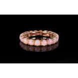 Pink Opal Full Eternity Ring, a full circle of round cut pink opals, mined in Peru, totalling 3.