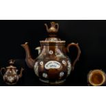 A Large Bargeware Teapot Of typical form with treacle glaze,