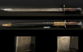 A British 1907 Bayonet And Scabbard Marked Chapman to blade, complete with original scabbard.