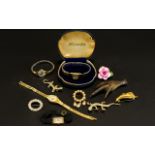 A Collection Of Costume Jewellery A varied lot to include 1920's cocktail watch with black