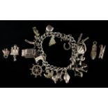 Solid Silver Curb Bracelet Loaded with 14 Nice Quality Silver Charms + 4 Loose Charms,