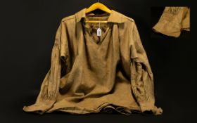 A 19th Century Agricultural Workers Smock Shirt Of Mid Brown Drabbet Comprising open v-neck collar