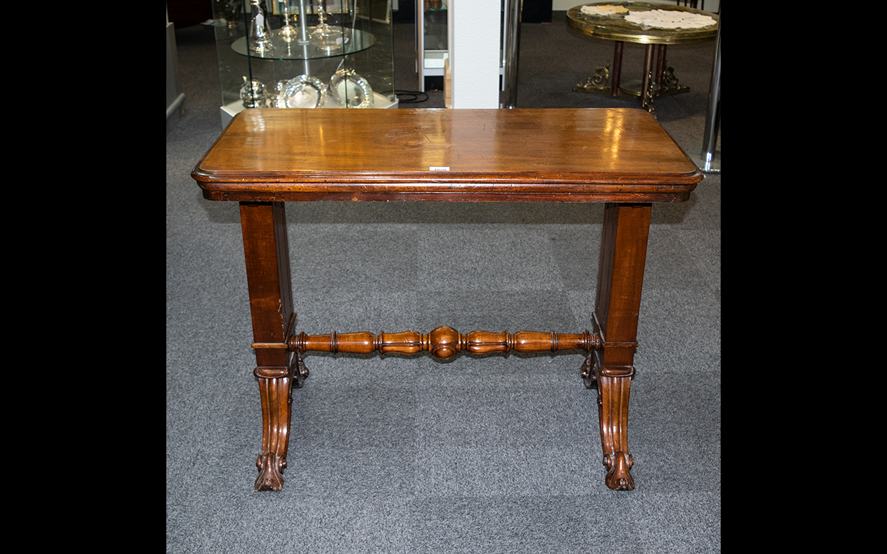 A Victorian Mahogany Three-tier Metamorphic Buffet/Dumb Waiter with moulded edge to the rounded