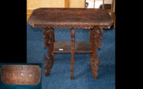 Indonesian Carved Wood Occasional Table. Rectangular Top And Stretcher.