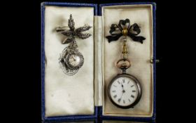 A Ladies Marcasite Set Ciro Nurses Watch Manual wind with leaf design brooch.