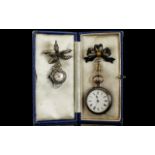 A Ladies Marcasite Set Ciro Nurses Watch Manual wind with leaf design brooch.