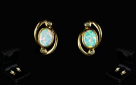 Ladies - Good Quality and Pleasing Pair of Opal and Diamond Earrings - Set In 9ct Gold.