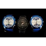 Gents Fashion Wrist Watches - Three In Total. All With Stainless Steel Backs.