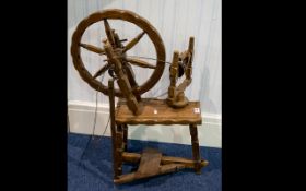 A Display Purposes Spinning Wheel Model of spinning wheel in varnished beech wood.