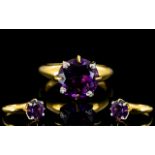 Amethyst Solitaire Ring with diamond tipped claws; a 4.5ct deep purple, round cut amethyst in a