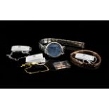 A Mixed Collection Of Contemporary Costume Jewellery And Watch Four items in total to include two