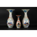 Three Oriental Japanese Vases Each with long neck and scalloped rim. Each with Imari style