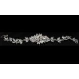 White Austrian Crystal Leaf Bracelet, with a solid, curved centrepiece with sprays of stylised