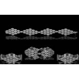 18ct White Gold Italian Diamond Bracelet Comprising four lozenge form panels,