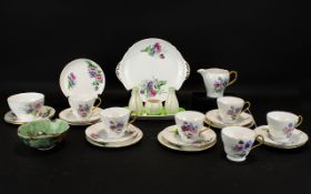 Shelley Fine Bone China Part Tea Set white with floral decorative pattern.