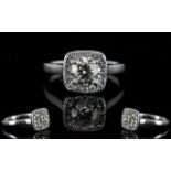 18ct White Gold Diamond Set Halo Dress Ring of Attractive Form and Top Quality. Full Hallmark for