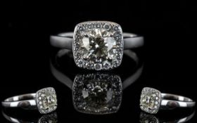 18ct White Gold Diamond Set Halo Dress Ring of Attractive Form and Top Quality. Full Hallmark for