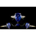 18ct Gold - Superb Quality Tanzanite and Diamond Set Ring.