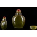 Oriental Agate Snuff Bottle Hardstone bottle of typical form with carnelian cabochon to top and