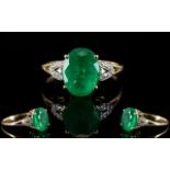18ct Gold - Faceted Oval Shaped Emerald and Diamond Set Dress Ring,