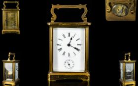 English Late 19th Century Brass Cased Carriage Clock with Alarm Facility Glass Panels,