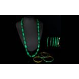 A Collection Of Malachite And Mixed Metal Jewellery Eleven items in total to include polished