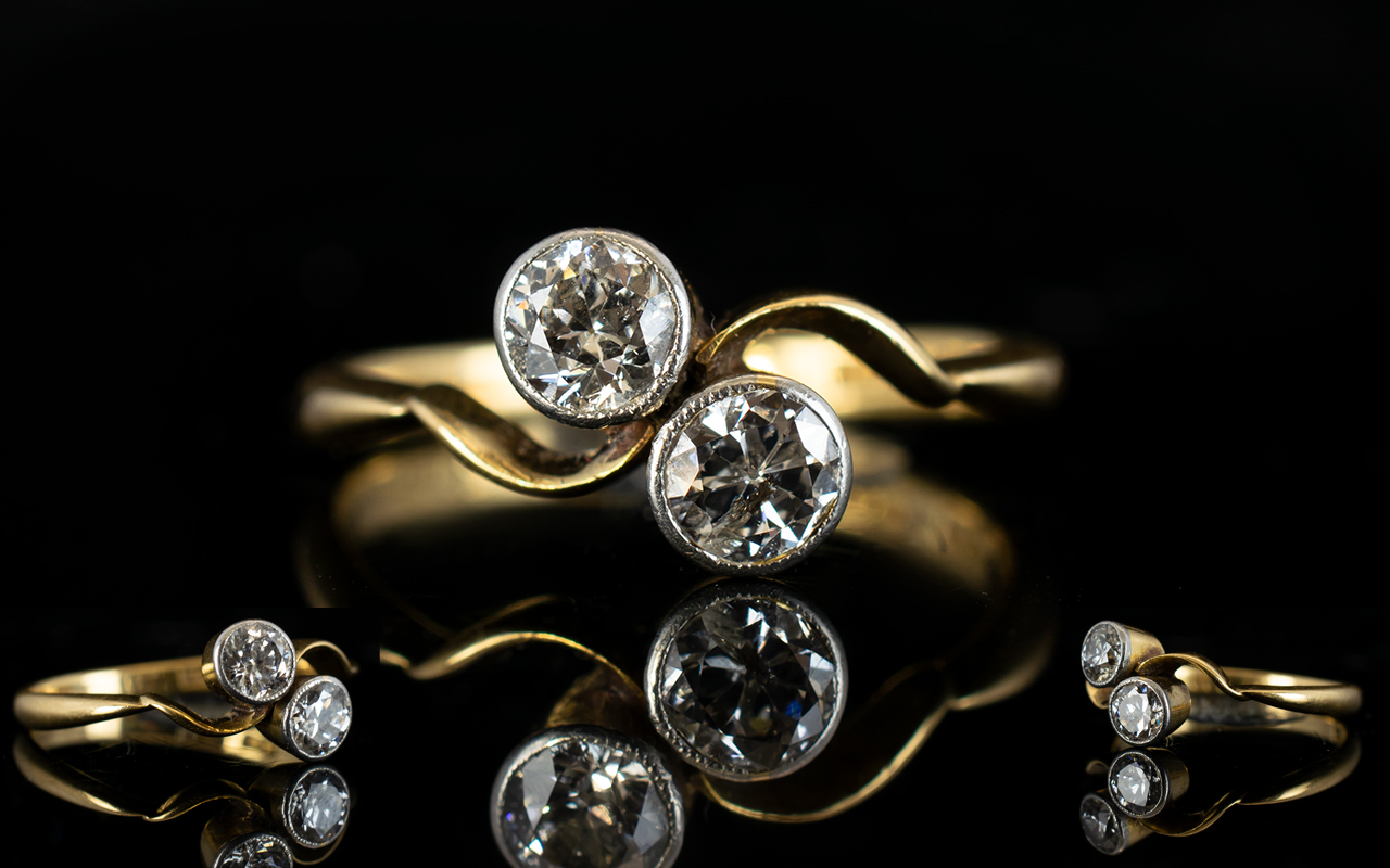 18ct Gold Two Stone Diamond Crossover Ring, The Two Old Round Cut Diamonds of Good Colour / Clarity.