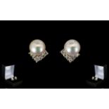 18ct White Gold Pearl And Diamond Set Stud Earrings Contemporary stud earrings,